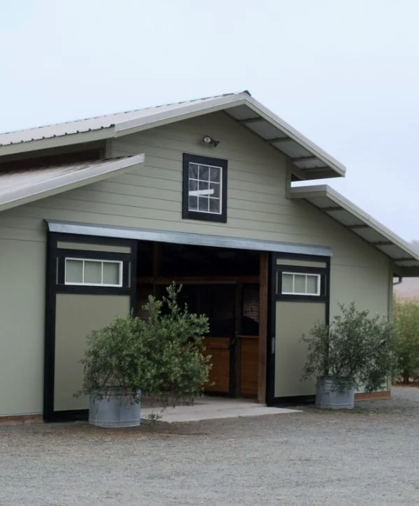 Barn entrance and paddocks
